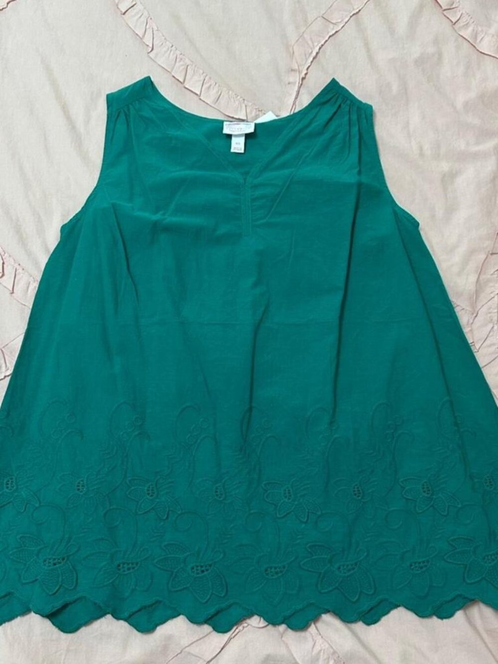 Ingrid & Isabel green maternity top with floral embroidery and scalloped hem.